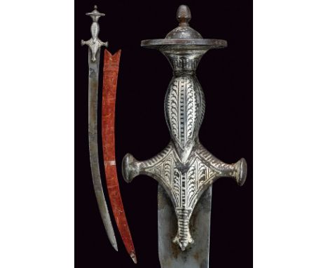 A tulvar dating: 19th Centuryprovenance: IndiaFlat, single -and false-edged, damask combat-blade with tang (areas of rust); t