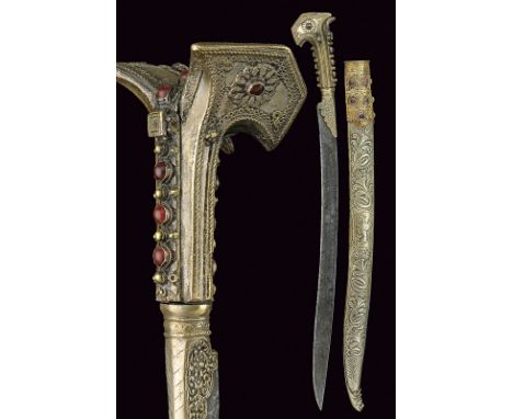 An interesting yatagan with scabbard dating: first quarter of the 19th Centuryprovenance: TurkeyCurved, single-edged, iron bl
