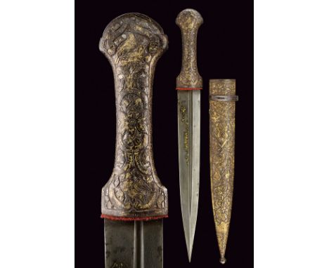 A small kindjal dating: 19th Centuryprovenance: PersiaStraight, double-edged blade of fine damask, with asymmetrical fullers,