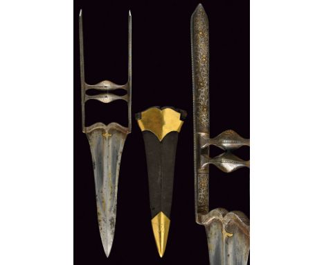 A fine katar dating: early 19th Centuryprovenance: IndiaStrong, damask, double-edged blade, central raiser and strengthened t