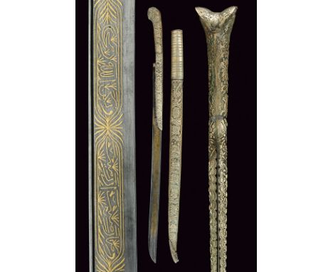 A rare yatagan dating: mid-19th Centuryprovenance: BalkansStraight, single-edged blade with a thin groove at the back, decora