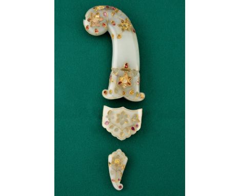 Jade grip and scabbard garniture of a Moghul kandshar, featuring gold and rubies dating: circa 1700provenance: India MoghulGr