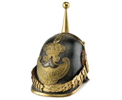 A Civil Guard officer's helmet dating: mid-19th Centuryprovenance: Grand Duchy of TuscanySkull of boiled leather; front emble