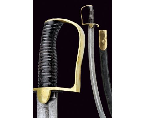 A cavalry sabre dating: 19th Centuryprovenance: EuropeWide, curved, single -and false-edged blade with a wide fuller at the c