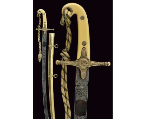 An officers sabre dating: 20th Centuryprovenance: EnglandSlightly curved blade with no edge, engraved with trophies and flora