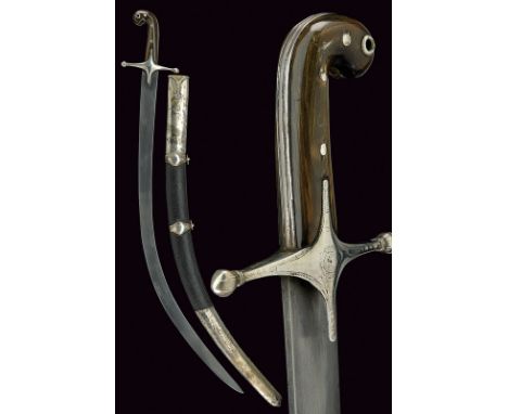 A shamshir dating: circa 1800provenance: TurkeyWide, curved, flat, damask blade; silver hilt with cross-quillon engraved with
