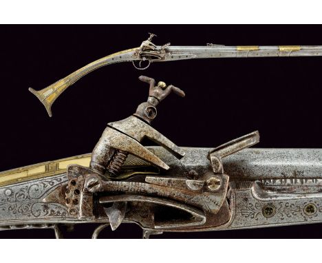 A fine flintlock gun dating: first quarter of the 19th Centuryprovenance: AlbaniaLong, round, 15 mm cal. barrel with moulded 