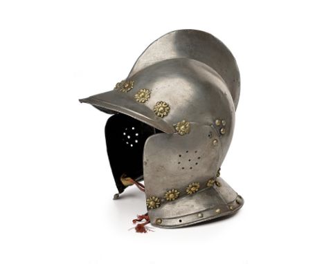 A burgonet dating: late 16th Centuryprovenance: GermanySkull in one piece, with average tall comb, with twisted border; point
