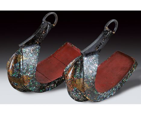 A pair of abumi (stirrups) dating: 19th Centuryprovenance: JapanIron structure and loop; curved, wooden treads; the entire su