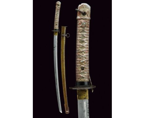 A military katana dating: second quarter of the 20th Centuryprovenance: JapanFor a non-commissioned officer. Blade grooved at