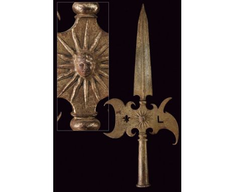 A halberd of the "Cent Suisses" of Louis XIV dating: first quarter of the 18th Centuryprovenance: FranceIron head with straig