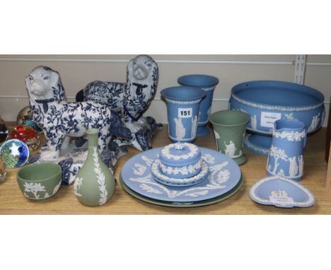 A collection of thirteen pieces of green and pale blue Wedgwood jasper pottery and a pair of ceramic dogs