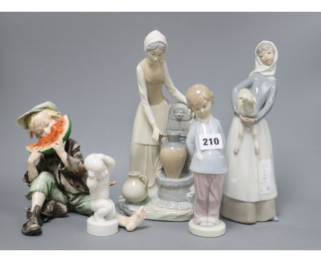 A collection of six Lladro and Nao figures tallest 28cm