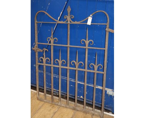 A wrought iron garden gate W.80cm