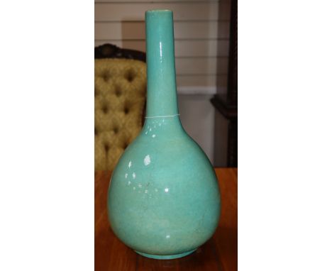 A large Chinese turquoise crackle-glazed bottle vase, incised Kangxi mark but later height 43cm