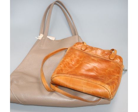 A Gucci tan leather bag and a Celine leather bag