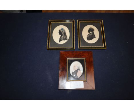 A pair of framed silhouettes and oval portrait miniature
