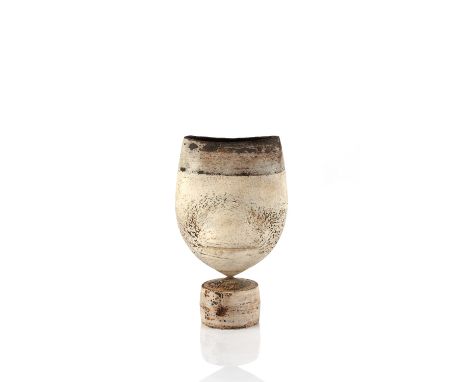 Hans Coper (1920-1981) 'Cycladic' pot stoneware with textured glaze impressed potter's seal 15cm high, 8cm across. Provenance