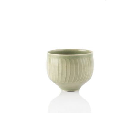 David Leach (1911-2005) Footed bowl celadon with fluted body 8.5cm high, 10.1cm diameter. Provenance: Collection of Peter Din