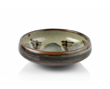 Bernard Leach (1887-1979)  Bowl with blue wave brushwork and tenmoku ferns signed with initials 11.7cm diameter.