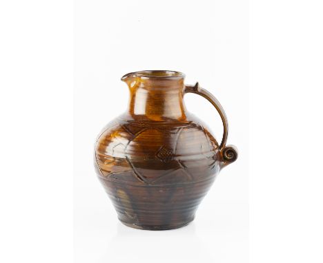 Charlotte Epton (1902-1970) at Leach Pottery Jug, circa 1927-1930 treacle glaze, the jug with incised bands of decoration imp