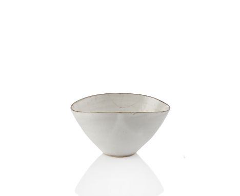 Lucie Rie (1902-1995) Bowl elliptical form, white glaze impressed potter's seal 8cm high, 15cm across. Provenance: Collection