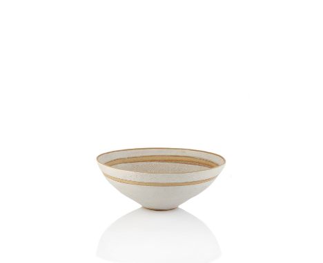 Lucie Rie (1902-1995) Bowl matte white glaze with single band around the rim impressed potter's seal 8.5cm high, 23cm diamete