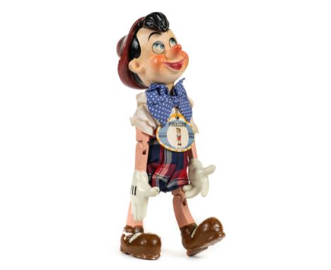 Furga. Pinocchio puppet, circa 1945, painted papier-maché puppet, with jointed wooden arms and legs (elbows stiff), with orig