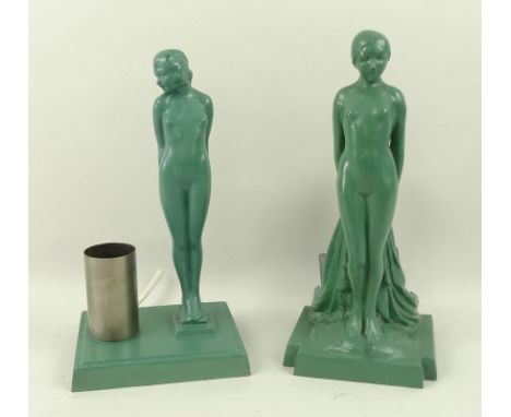 A pair of Art Deco figural table lamps, applied arts, spelter with green enamel patina, modelled as a female nudes, on steppe