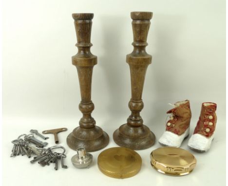 A pair of Victorian baby button shoes, a pair of oak candlesticks, 17cm, an assortment of keys, two compacts, and an Edison p