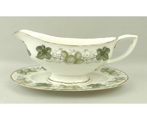 A Royal Worcester part tea and dinner service, 'the Worcester Hop' 'Mathon' pattern, comprising oval platter, sauce boat and 
