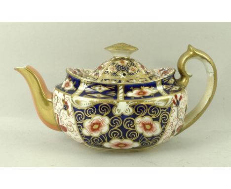 A Royal Crown Derby part tea service, in the Imari pattern, marked 2451, comprising tea pot, slop bowl, milk jug, sugar bowl,