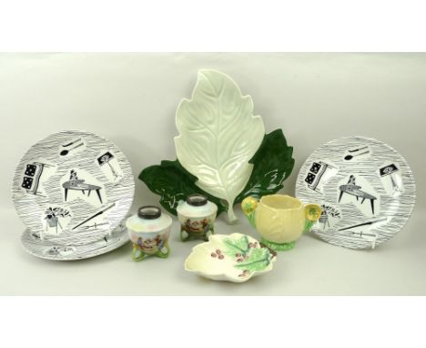 A group of ceramics comprising three 'Homemaker' plates, a pair of Bavarian posy vases decorated with children playing, 8cm, 