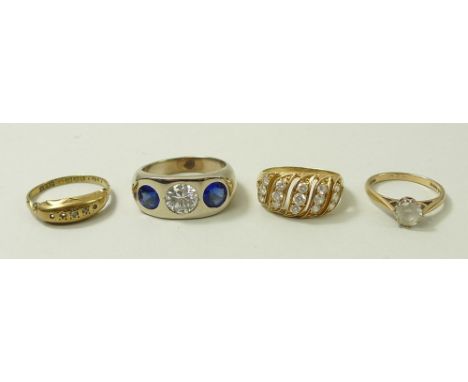 An 18ct gold ring set with five stones (three missing), size N, 9ct gold ring set with paste stone, size K, a 14k white gold 