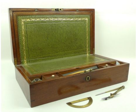 A mahogany writing slop with fitted interior, tooled green leather, ivory finials to interior boxes and brass escutcheon, 45 