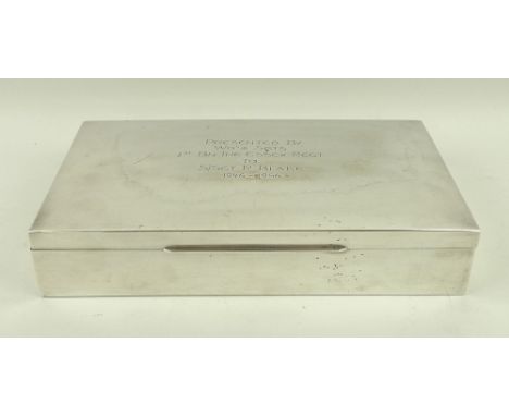 A silver cigarette box, engraved to lid 'Presented By Wo's & Sgts 1st Bn The Essex Regt to S/Sgt R. Blake 1946-1956', hallmar