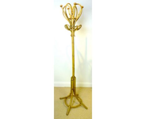 A 20th century bentwood hat stand of light coloured bentwood and bobbin terminals, 63 by 185cm high.