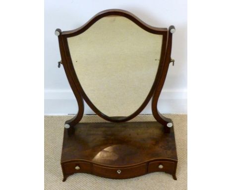 A 19th century mahogany toilet mirror with lyre shaped supports and shield shaped plate, set with turned ivory decoration, be