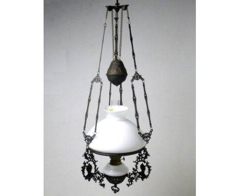 A Victorian cast iron, raise and pull, ceiling oil lamp cast with rococo scrolls and profiles of HRH Princess Alexandra of Wa