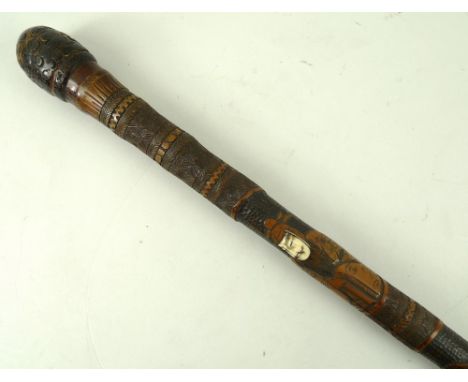 A shibayama bamboo walking stick, carved with figures with inset ivory faces, 84cm. 