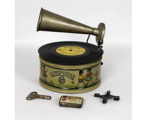A 1930's German clockwork tinplate 'Lemiphone' child's gramophone, the circular body decorated with children playing and 'LM'