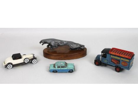 A collection of models including Dinky Toys 166 Sunbeam Rapier, Meccano Ltd, a Jaguar car mascot, a Mack Sunshine Biscuits tr