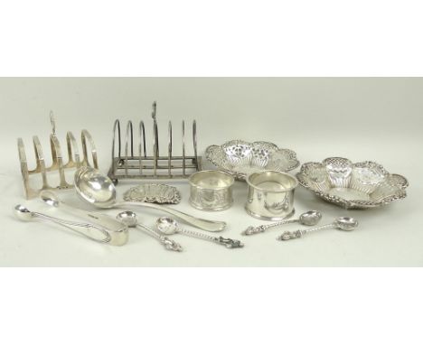 A collection of Victorian and later silver, comprising a wire toast rack on four ball feet, William Hutton & Sons Ltd., Londo