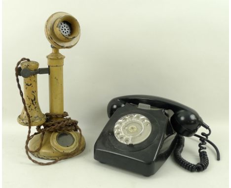 A stick telephone, later painted, impressed mark to neck No 24, 32cm, and a black bakelite telephone, P.O. authorised. (2)
Pr