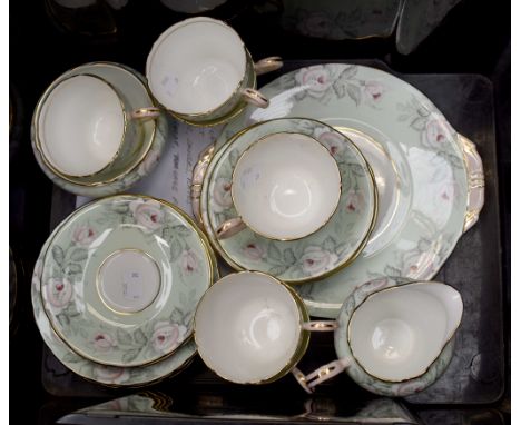 An Aynsley 21 piece tea service, pattern circa 1801, Eau de Nil ground with roses