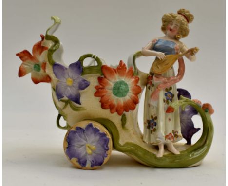 A German mantle Cornucopia vase circa 1920's with woman playing lute