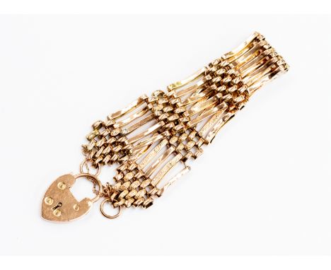 A 9ct gold 5 bar gate bracelet, padlock clasp, weight approx  21.6 grams