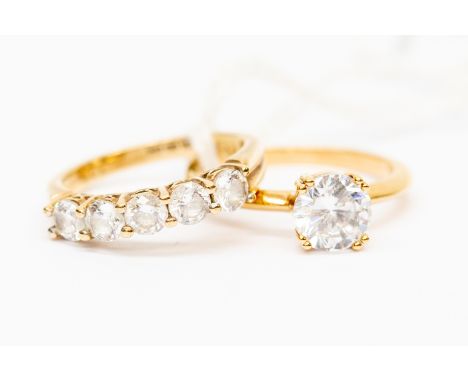 A 9ct gold and cubic zirconia five stone ring, total gross weight approx 3gms, along with a gold plated cubic zirconia  dress