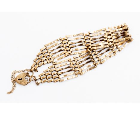 A 9ct gold six bar gate link bracelet, padlock clasp, weight approx 9.74 grams