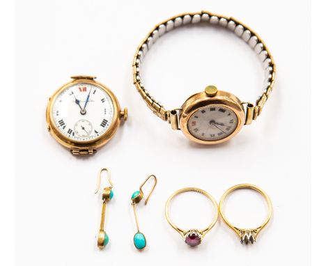 An 18ct. yellow gold and garnet ring, gross weight 2.1gms; together with a pair of 15ct. yellow gold and turquoise drop earri